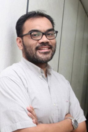 Farishad Latjuba as Debt Collector