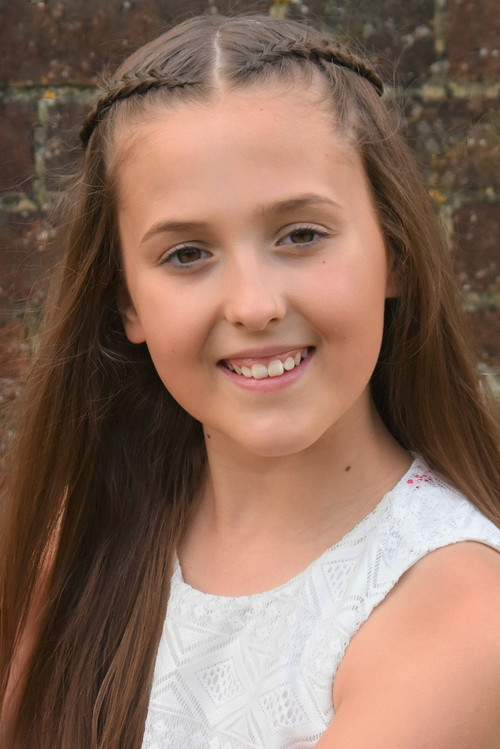 Anya Evans as Tina Denmark