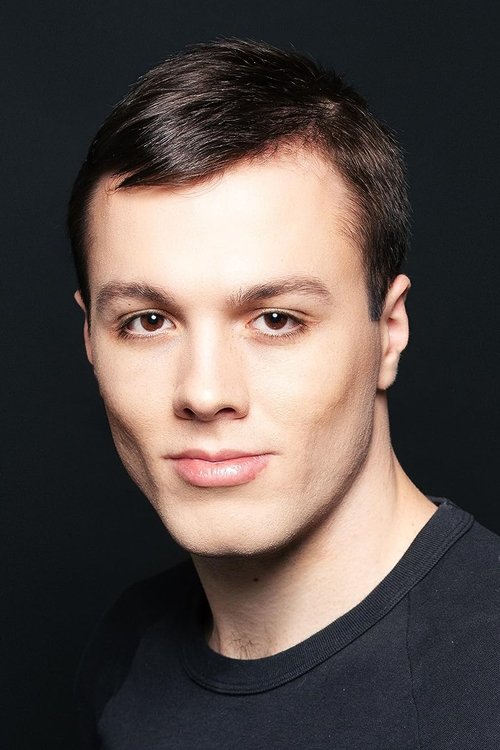 David James Austin as Bar patron