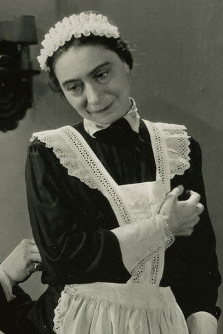 Marcelle Barry as Boss of the bar (uncredited)