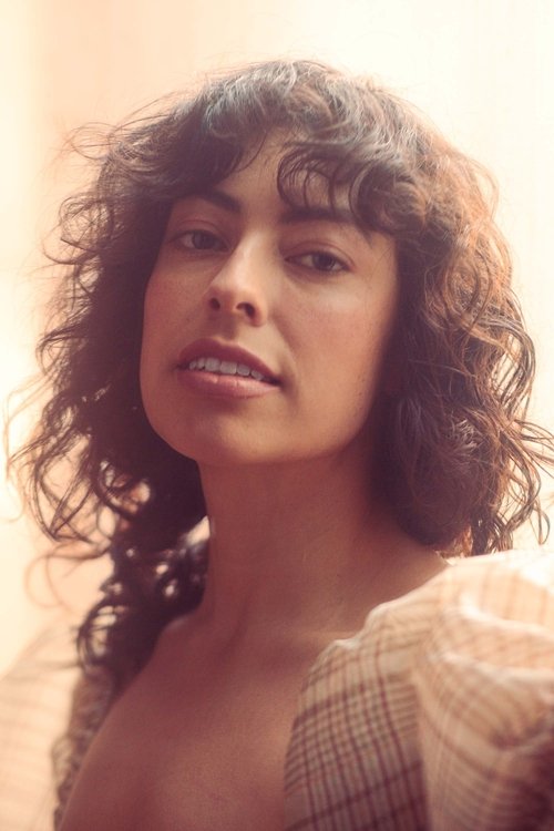 Claudia Restrepo as Woman on street