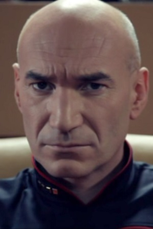 Giles Aston as Captain Jean-Luc Picard
