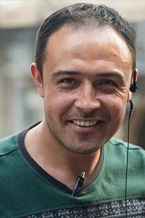 Kurbanjan Turdahon as 库尔班·土鲁木