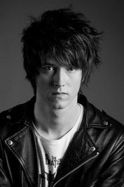 Julien Jakout as Julien, the bassist (uncredited)