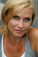 Simone Heher as Christl Huber