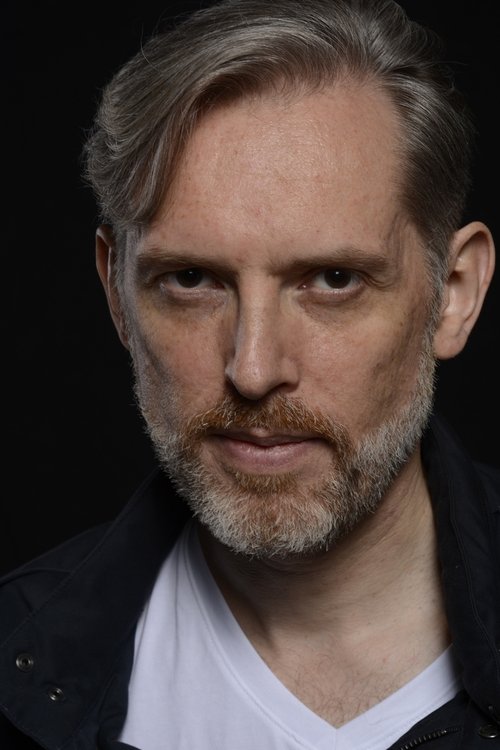 Laurent Winkler as Train Conductor