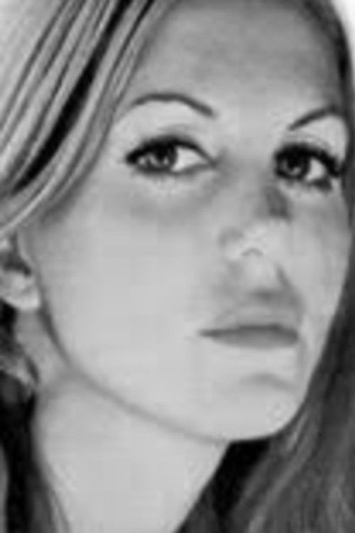 Carole Basetta as Designer