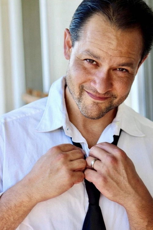 Nicholas Sarando as Paparazzi