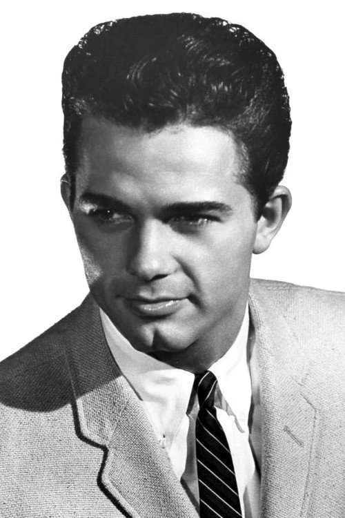 Rian Garrick as Dan Hallett