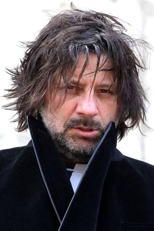 Christian Iansante as Il macchinista (voice)