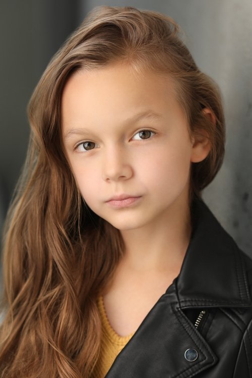 Mila Morgan as Young Girl