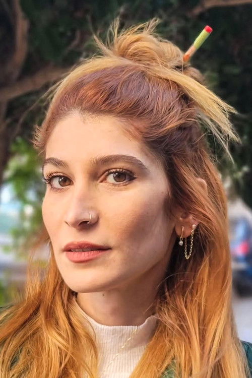 Maya Dagher as Ghenwa - the waitress