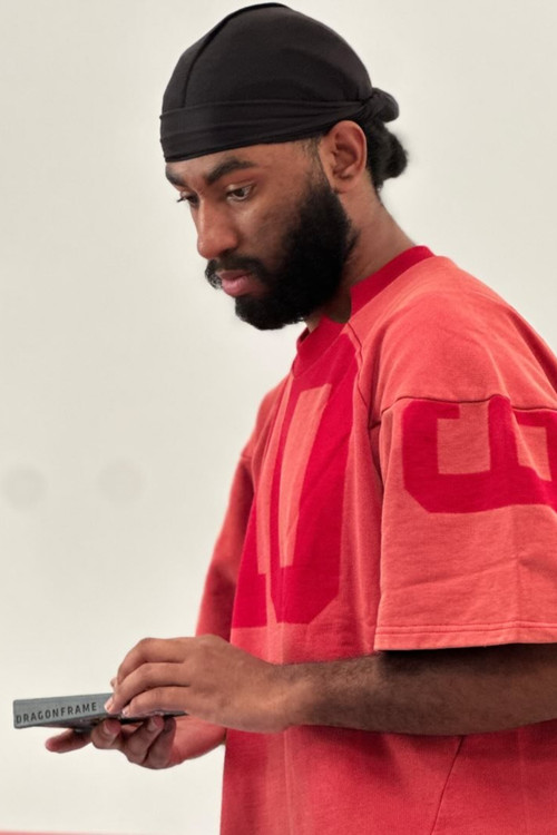 Akash Jones as Black Adam (voice)