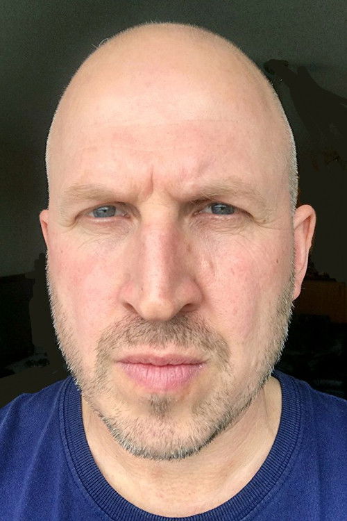 Tim Wildman as Funeral Guest (uncredited)