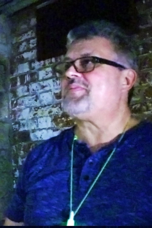 Luis Santiago as Paranormal Investigator