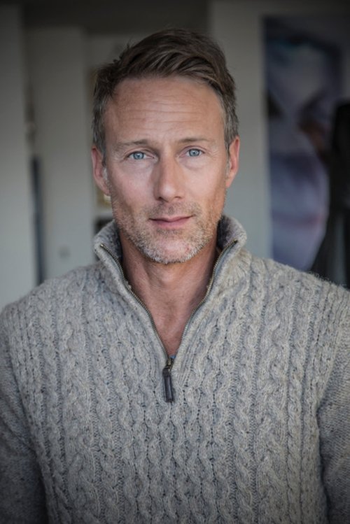 Anthony Dowding as Man in Bar