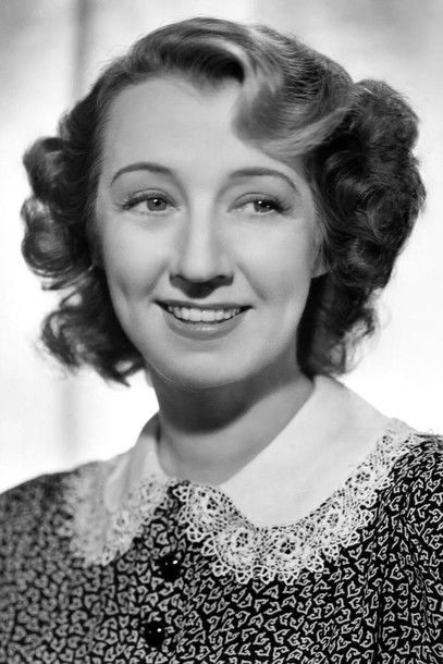 Marie Blake as Waitress (uncredited)