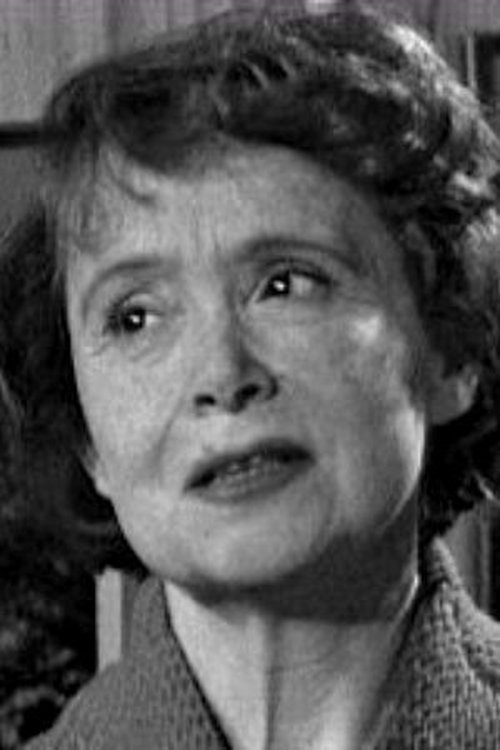 Mollie Maureen as Mrs. Spinks