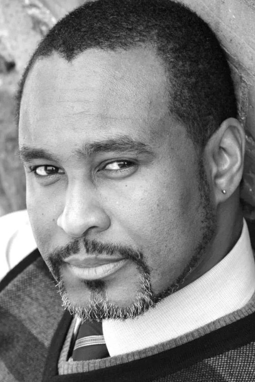 Xuan Fraser as Nicholas / Merchant / Servant / Attendant / Market Worker / Officer / Usher / Townsperson