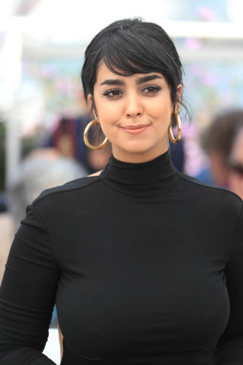 Mariam Al Ferjani as Omayma