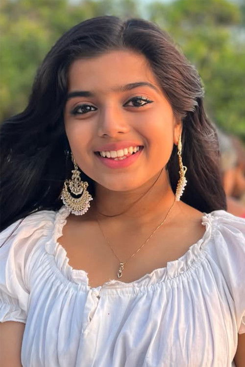 Amritha Varshini as Shanmughan and Lalitha's Daughter