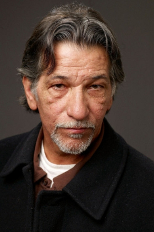 Luis Saguar as T.J.