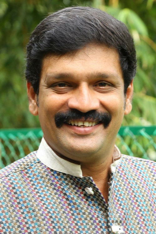 E. V. Ganesh Babu as 