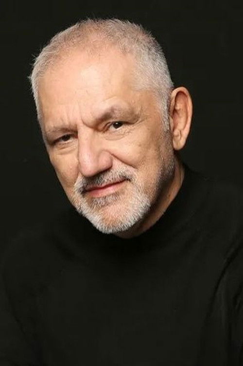 Nikos Portokaloglou as Singer