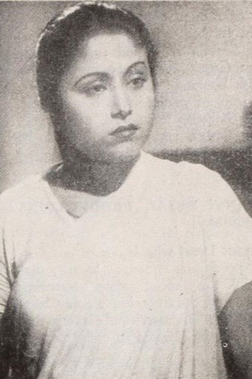 Molina Devi as Rajanibabu's wife