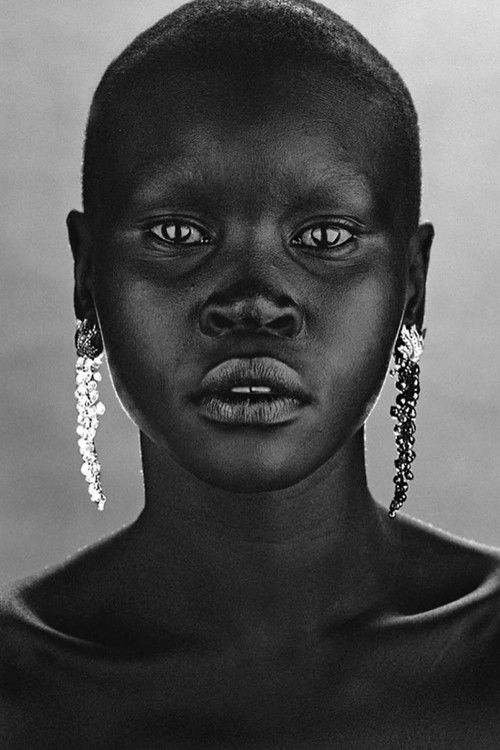 Alek Wek as Miss Millius