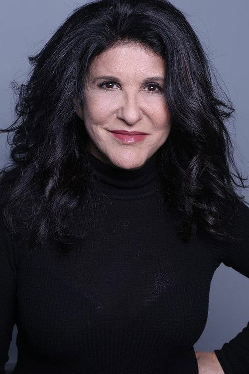 Keri Tombazian as JoAnn Davidson