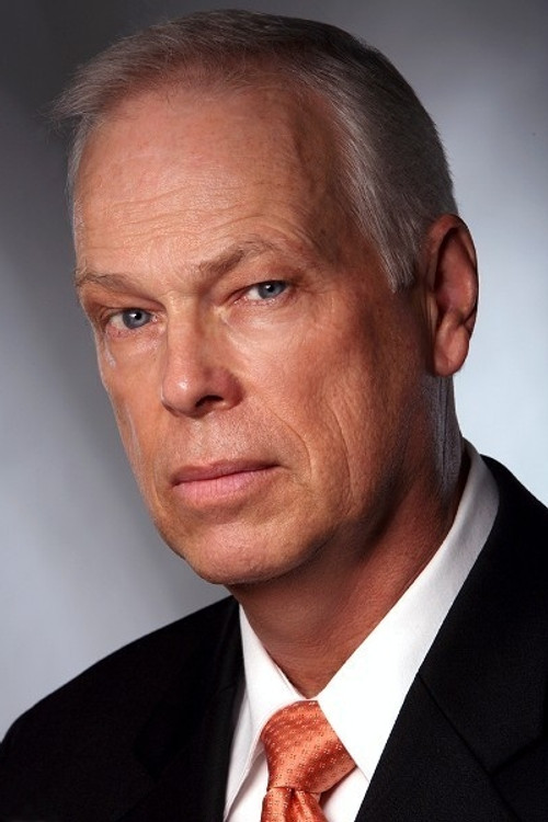 Richard Holden as Race Announcer (uncredited)