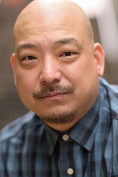 Simon Yin as Office Co-Worker