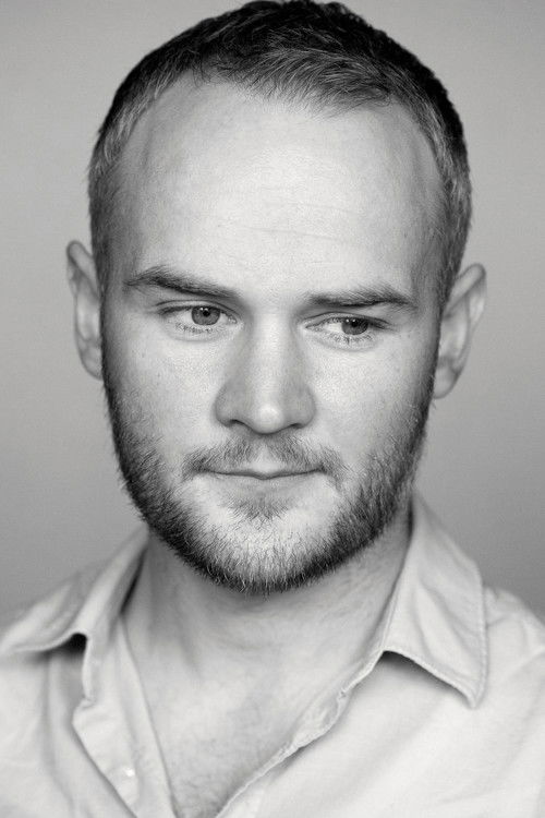 Oliver Lansley as Man In Toilet #2