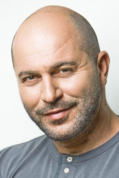 Lior Raz as Nira's husband