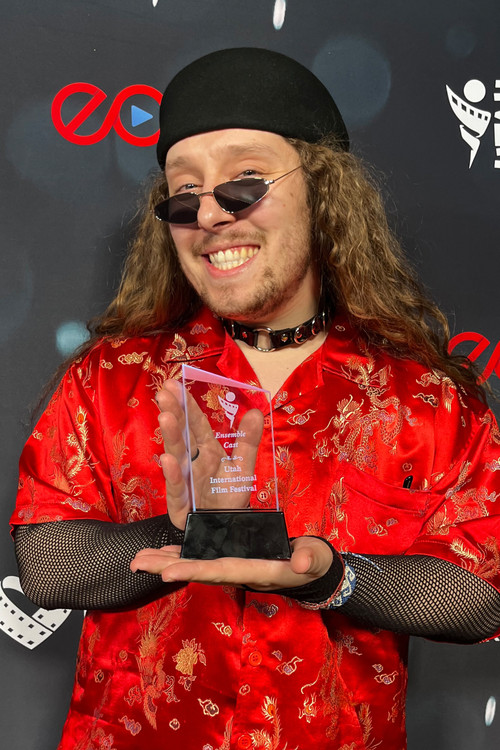 Tyler Harrah as British Rockstar