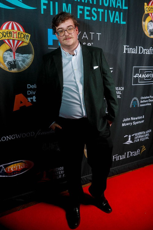 Richard Garriques III as Ring Announcer & Suspicious Figure