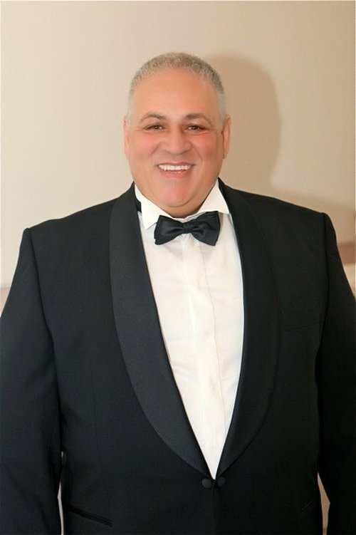 Bruno Praticò as Don Pomponio