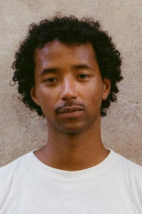 Misha Van der Werf as Manu