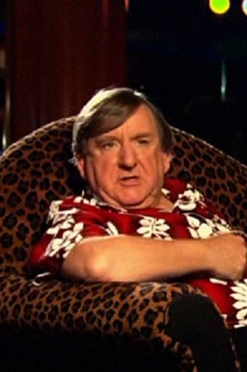 John D. Lamond as Peeping Tom Gardener / Man in Cinema