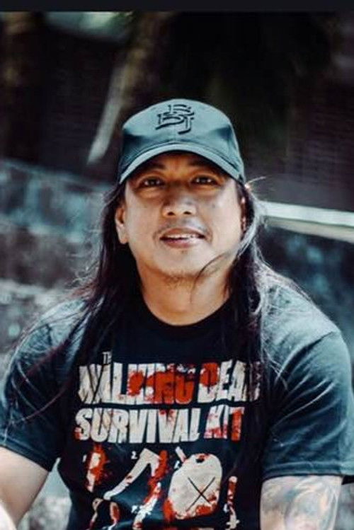 John Arceo as Man in Bus