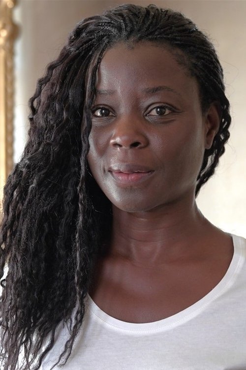 Tella Kpomahou as la mère de Guigui