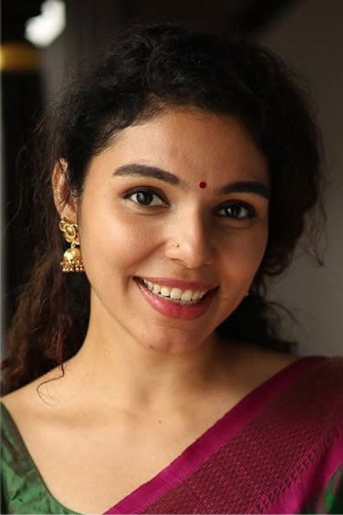 Tara Amala Joseph as Neha Gupta