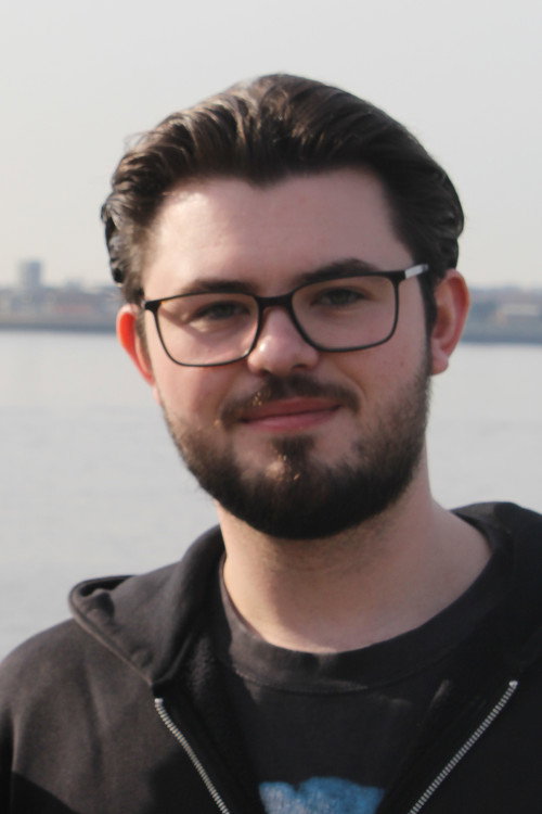 Joshua Lea as Police Officer