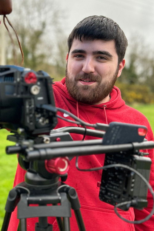 Callan Buckley as TJ