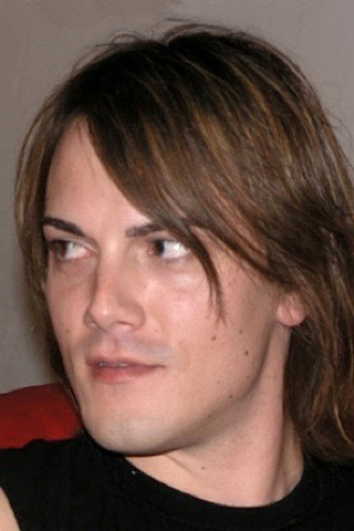 Sean Kane as (archive footage)