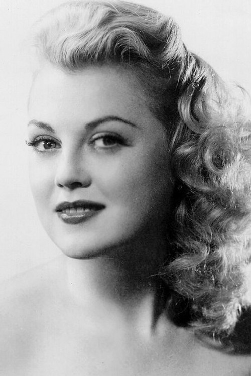 Suzi Crandall as Blonde Bank Customer (uncredited)