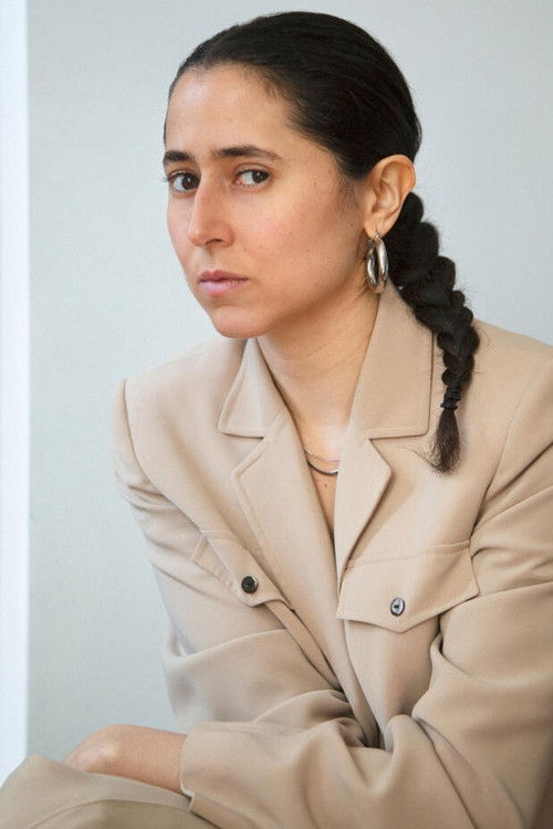 Meriem Bennani as Bouchra (voice)