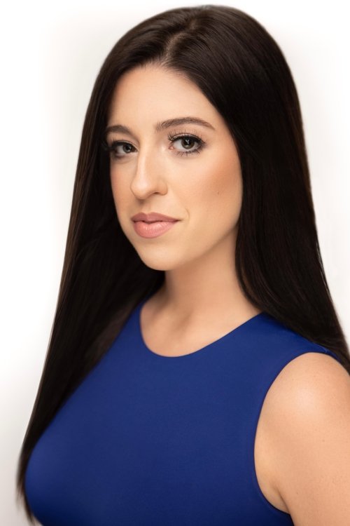 Lauren Carlin as Carly Carmichael