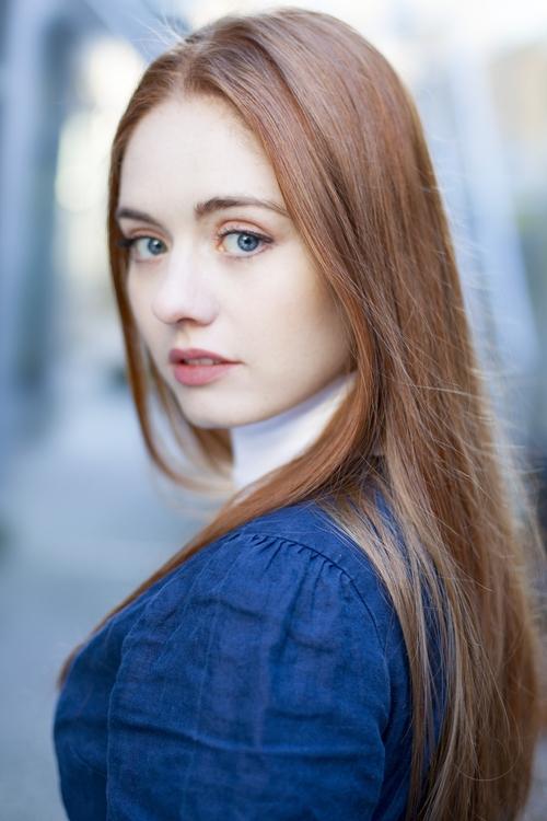 Brenna Llewellyn as Drive-Thru Associate